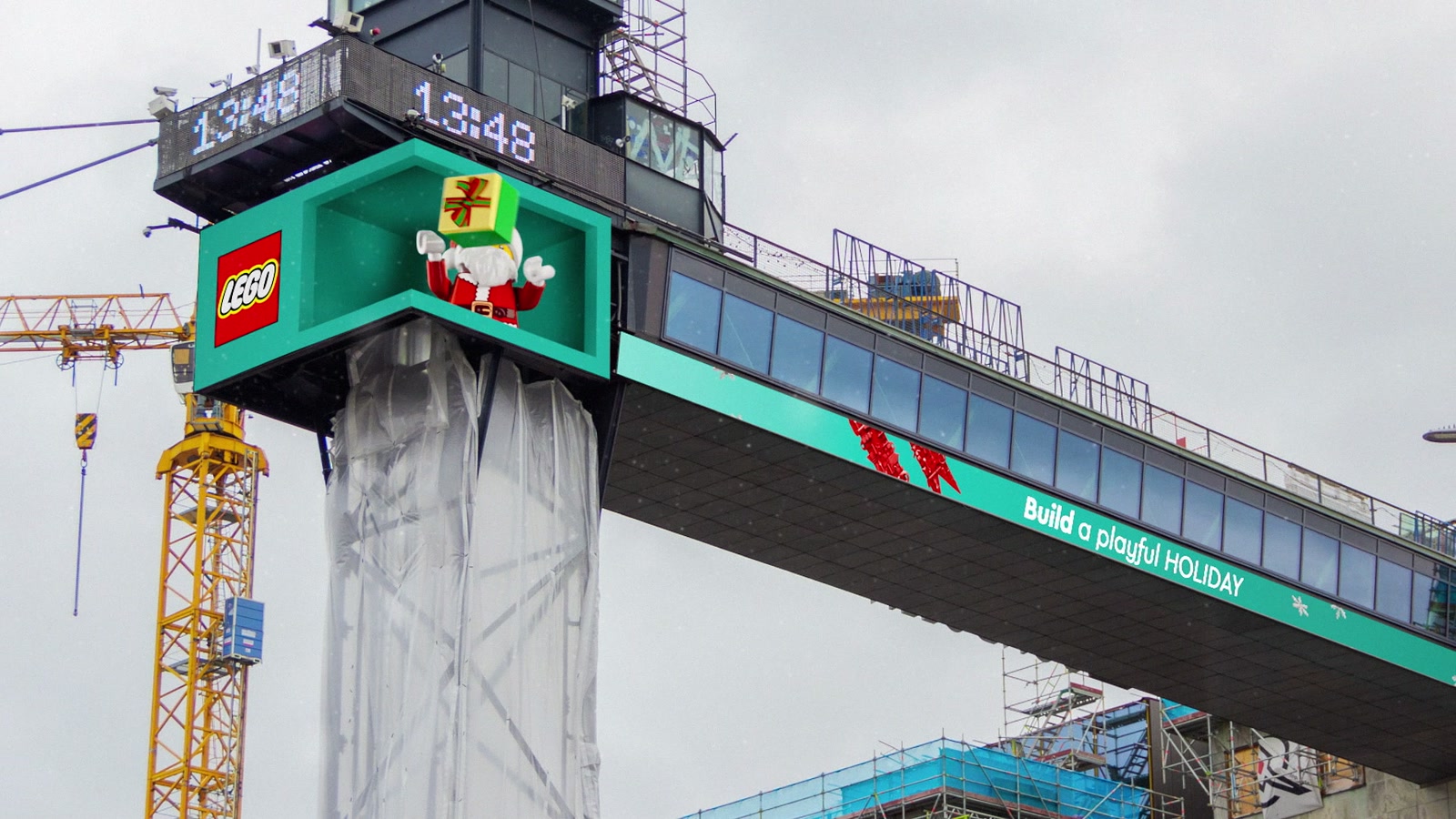 LEGO Santa appearing on the elevated Katarinahissen billboard in Stockholm